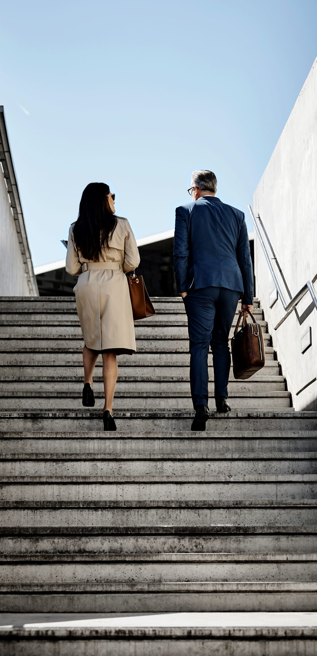 Co-Workers ascending stairs